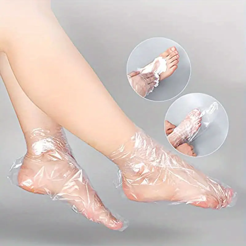 AliExpress 100/200Pcs Disposable Foot Moisturizing Socks Transprent Foot Bags PE Foot SPA Covers Callus Remover Feet Care Pedicure Tools, view 3