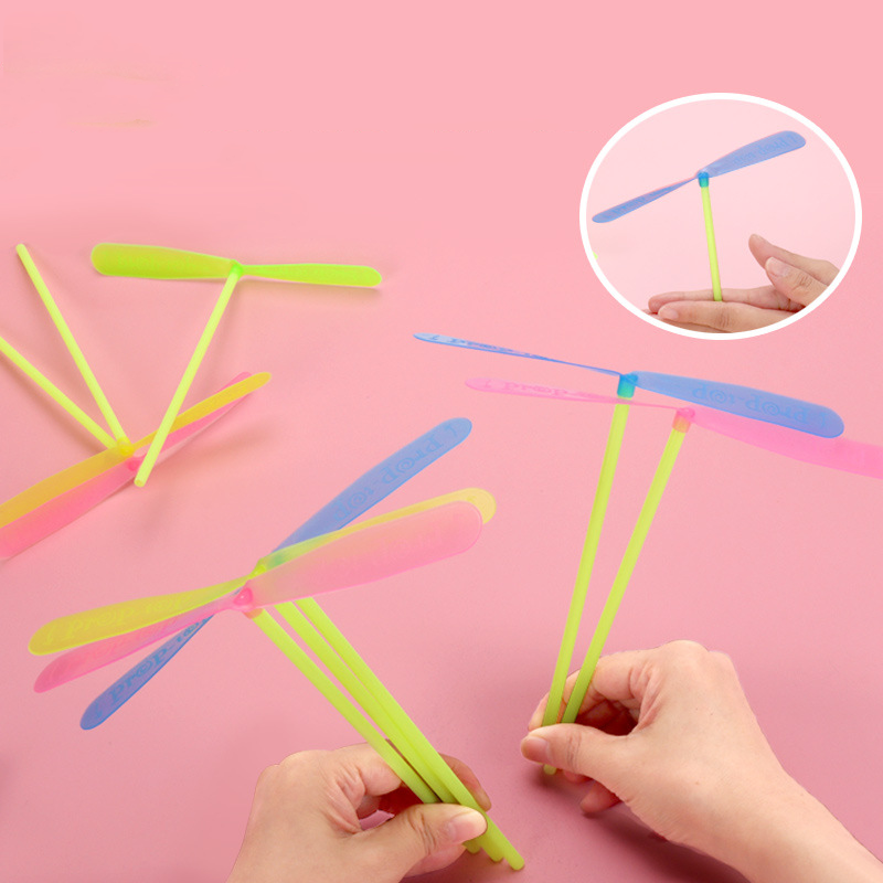 AliExpress 10Pcs Plastic Bamboo Dragonfly Shape Hand Push Flying Propeller Outdoor Sports Toy Gift Rotating Flying Arrow Outdoor Games, view 4