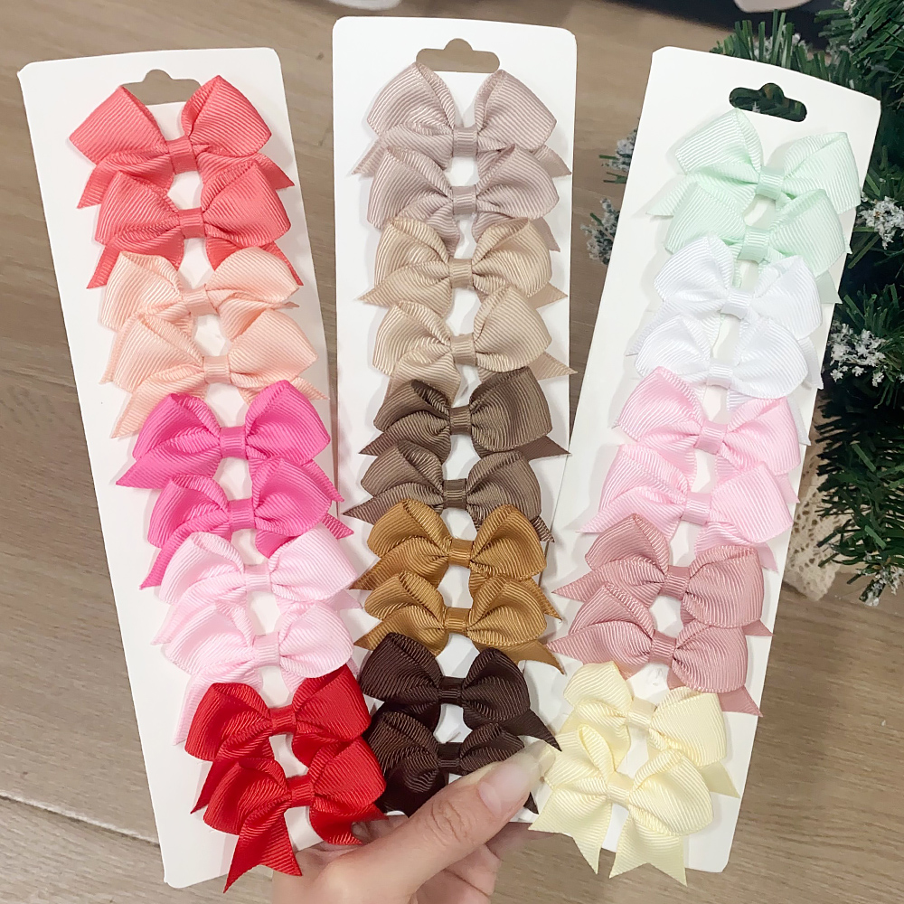 AliExpress 10Pcs/Set Solid Color Kids Bows Hair Clips for Baby Girls Handmade Ribbon Bowknot Hairpin Barrettes New Year Hair Accessories, view 2