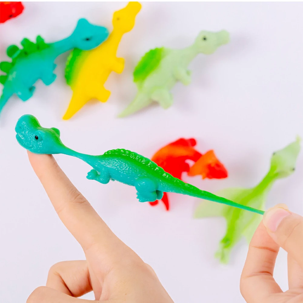 AliExpress 5-20Pcs Colorful Finger Catapult Dinosaur Games Birthday Shower Party Favor Giveaway Christmas Carnival Party Gift