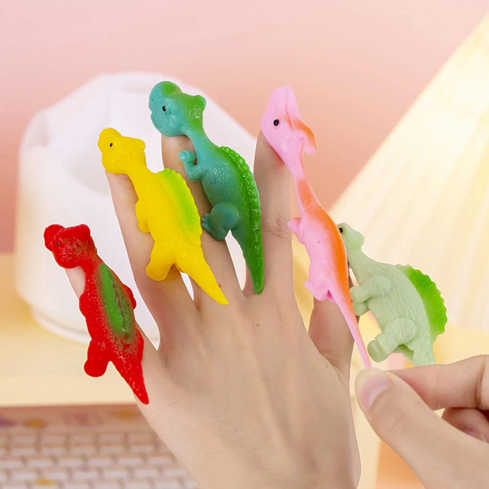 AliExpress 5-20Pcs Colorful Finger Catapult Dinosaur Games Birthday Shower Party Favor Giveaway Christmas Carnival Party Gift, view 5