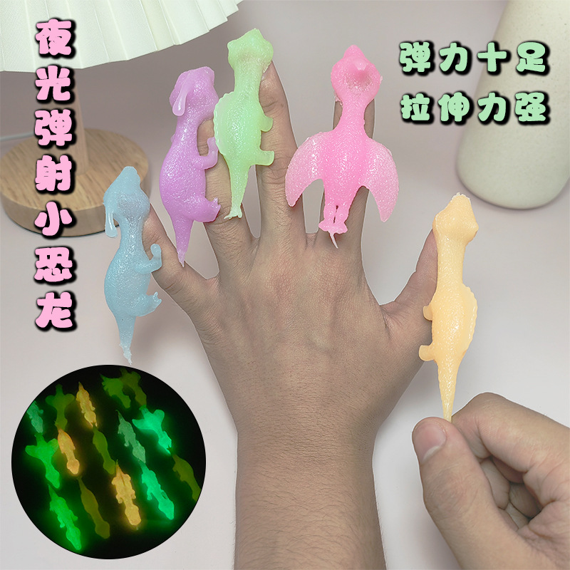 AliExpress 5-20Pcs Colorful Finger Catapult Noctilucent Dinosaur Games Birthday Shower Favor Giveaway Christmas Carnival Party Gift, view 2