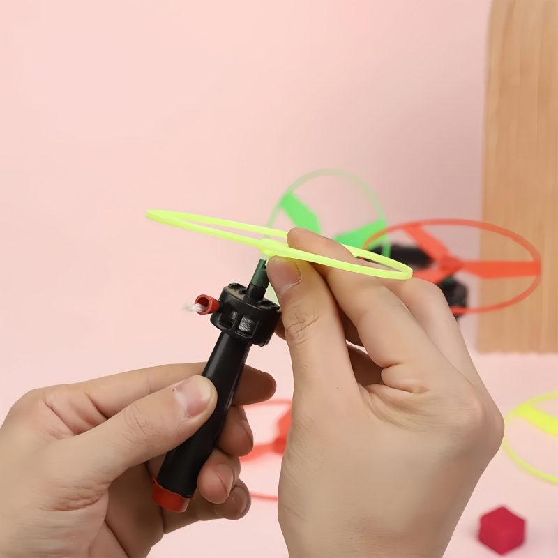 AliExpress 5pcs Colorful Plastic Pull String Hand-Push Flying Discs Propeller Helicopter Outdoor Toys for Kids Flying Spin Top Game, view 2