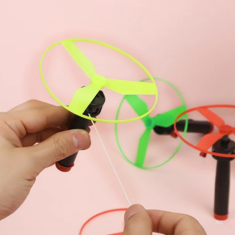 AliExpress 5pcs Colorful Plastic Pull String Hand-Push Flying Discs Propeller Helicopter Outdoor Toys for Kids Flying Spin Top Game, view 3