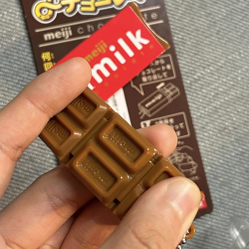 AliExpress Bandai Hot Japanese Style Simulated Meiji Chocolate Fidget Toy Stress Relief Keychain Bendable Snap Pendant Creative Gifts toys, view 2