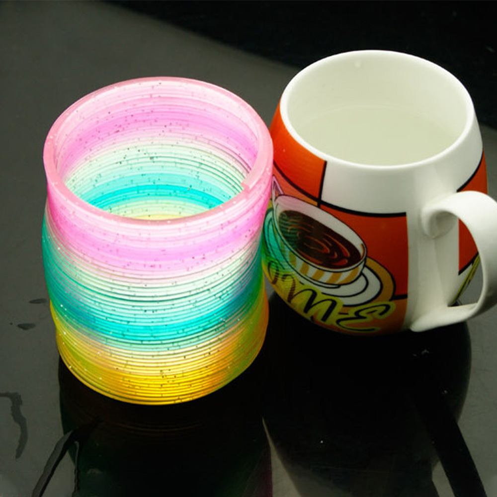 AliExpress Color Magic Bounce Toys Board Games for Children Anti-stress Magic Ring Spring Rainbow Board Game Kids Creative Funny Gifts, view 5