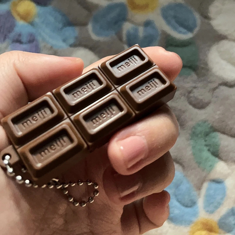 AliExpress Hot Simulated Meiji Chocolate Fidget Toy Bendy Snap-And-Play Stress Relief JP Style Keychain Pendant Funny Gift Creative Gadgets, view 4