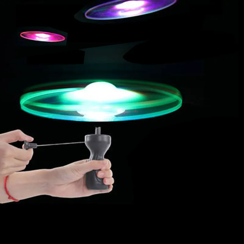 AliExpress Kid Sports Pull Line Saucer Toys Children outdoor Fun Rotating Flying Toy LED Light Processing Flash Flying Toy For Parks Beach