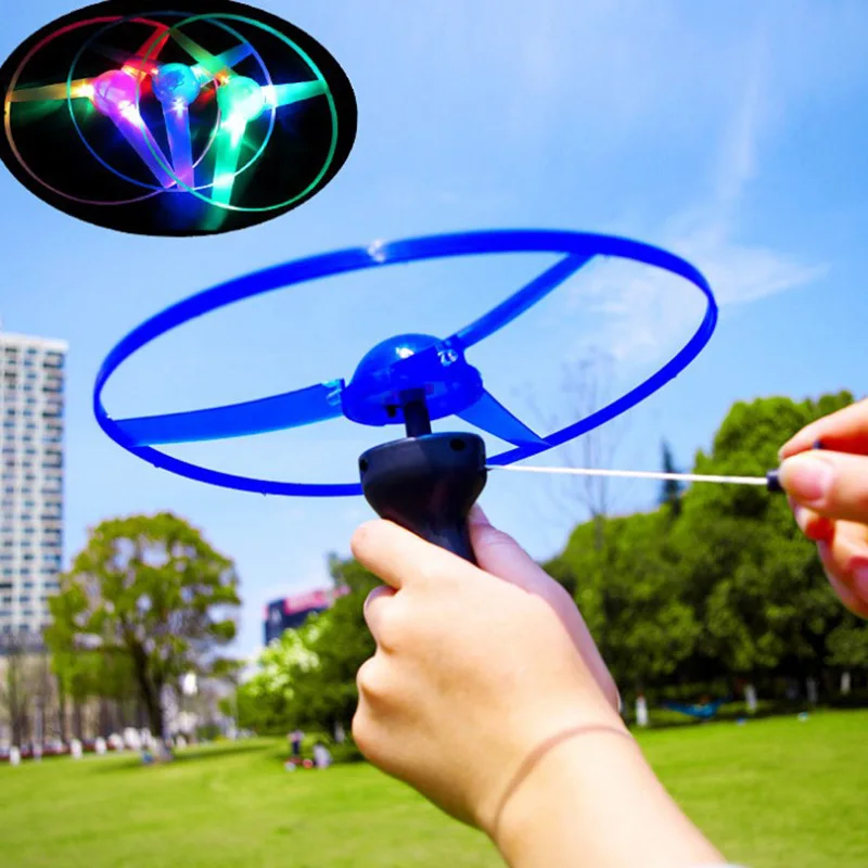 AliExpress Kid Sports Pull Line Saucer Toys Children outdoor Fun Rotating Flying Toy LED Light Processing Flash Flying Toy For Parks Beach, view 2