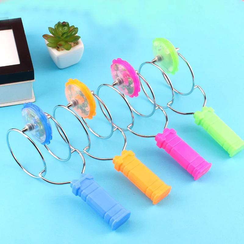 AliExpress Led Magic Magnetic Orbit Spinning Top Toy Creative Hand Cranked Color Luminous Colorful Gyroscope Rotating Handle Child Classic, view 4