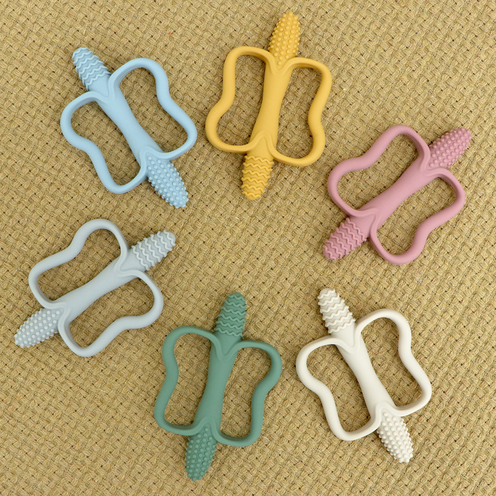 AliExpress One-piece silicone teething stick with handle, baby toy teether, 6 colors, easy to grip, corn-shaped teether, BPA-free., view 6