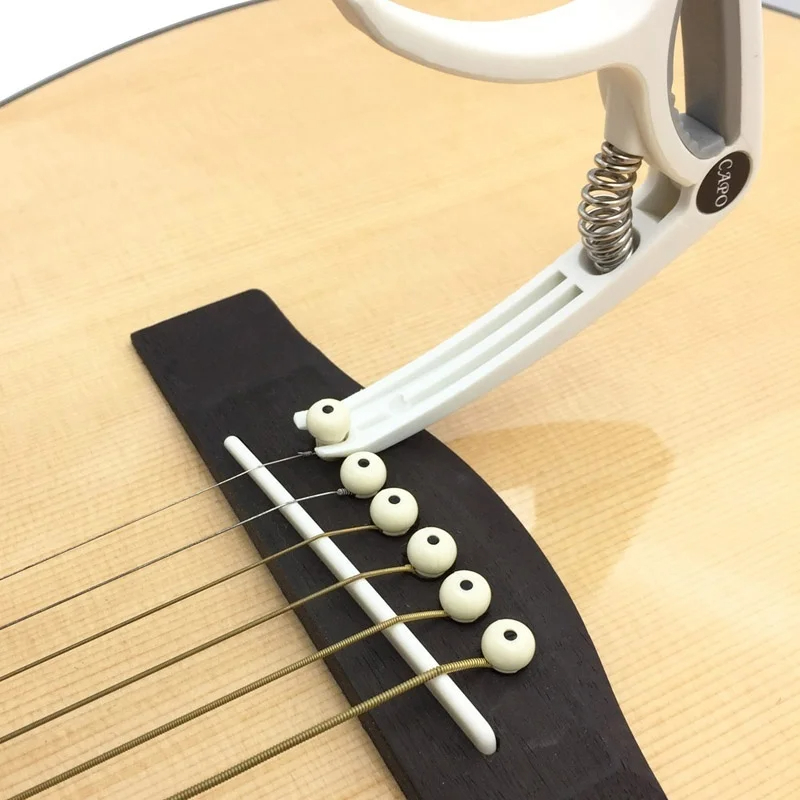 AliExpress Plastic Guitar Capo for 6 String Acoustic Classic Electric Guitarra Tuning Clamp Musical Instrument Accessories Electric Guitar, view 3