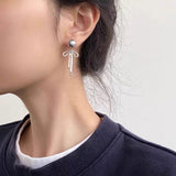 Boogzel Apparel Bow Pendant Pearl Earrings, view 3
