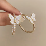 Boogzel Apparel Butterfly Crystal Hoop Earrings, view 4