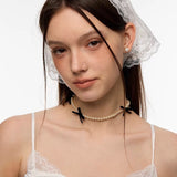 Boogzel Apparel Coquette Aeshetic Pearl Bow Choker, view 3