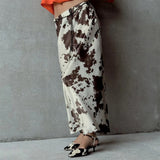 Boogzel Apparel Cow Print Satin Maxi Skirt, view 3