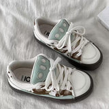 Boogzel Apparel Cow Print Skater Sneakers, view 4