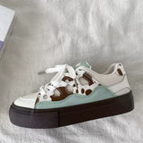 Boogzel Apparel Cow Print Skater Sneakers, view 6