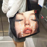 Boogzel Apparel Crying Face Pearls Tote Bag, view 5