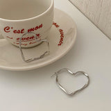 Boogzel Apparel Minimalist Aesthetic Heart Earrings, view 2