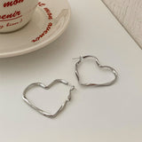Boogzel Apparel Minimalist Aesthetic Heart Earrings, view 3