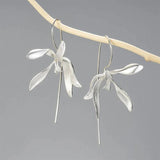 Boogzel Apparel Minimalist Aesthetic Orchid Earrings, view 2