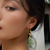 Boogzel Apparel Minimalist Aesthetic Spiral Earrings, view 3