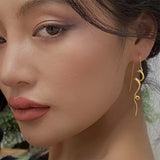 Boogzel Apparel Minimalist Aesthetic Spiral Earrings, view 4