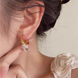 Boogzel Apparel Minimalist Clear Hoop Earrings, view 4