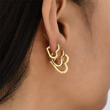 Boogzel Apparel Minimalist Heart-Shaped Earrings, view 4