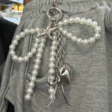 Boogzel Apparel Pearl Bow Charm Keychain, view 2