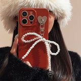 Boogzel Apparel Pop of Red Bowknot iPhone Case, view 3