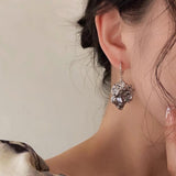 Boogzel Apparel Sculpted Face Abstract Earrings, view 2