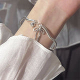 Boogzel Apparel Silver Bowknot Bracelet, view 2