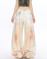 Boogzel Apparel Y2K Chain Print Wide Leg Jeans in Peach, view 2