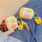 Boogzel Apparel Yellow Blooming Flowers AirPods Case, view 5