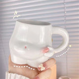 Boogzel Apparel Yummy Tummy Ceramic Mug, view 2