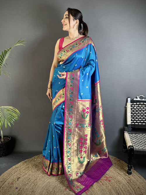 Dista Elora Blue Lichi Silk Ikkat Floral Motifs Zari Woven Paithani Saree