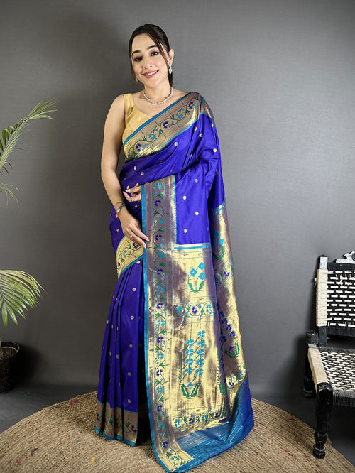 Dista Elora Blue Lichi Silk Ikkat Floral Motifs Zari Woven Paithani Saree