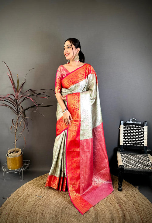Dista Elora Cream & Red Soft Silk Floral Zari Weaving Banarasi Saree