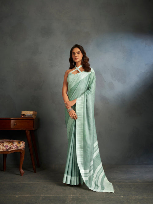 Dista Elora Light Green Soft Linen Silk Office Wear Saree With Chikankari Weaved Border