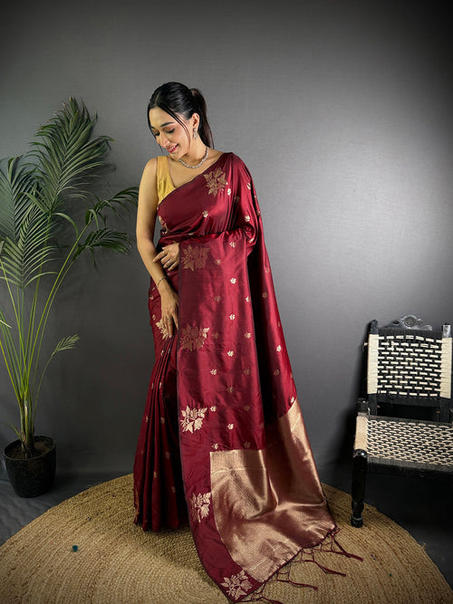 Dista Elora Maroon Lichi Silk Flower Zari Weaving Banarasi Saree