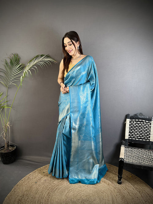 Dista Elora Ocean Blue Satin Silk Floral Motifs & Ethnic Silver Zari Design Kanchipuram Saree