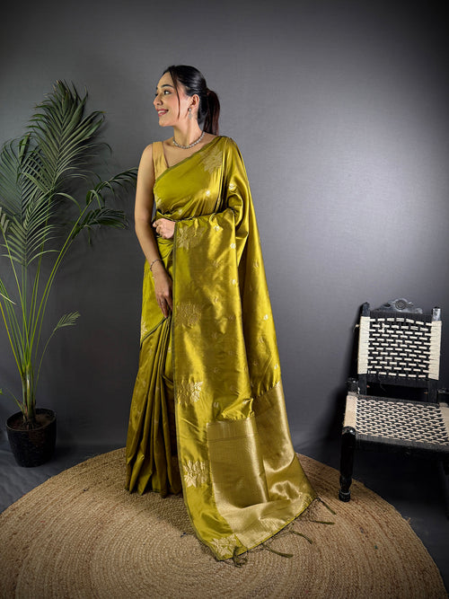 Dista Elora Olive Green Lichi Silk Flower Zari Weaving Banarasi Saree