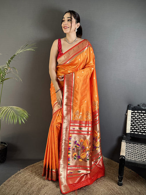 Dista Elora Orange Lichi Silk Floral Motifs Zari Weaving Paithani Saree