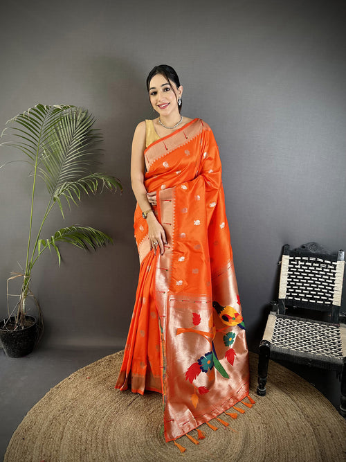 Dista Elora Orange Soft Silk Peacock & Floral Zari Motifs Kanchipuram Saree