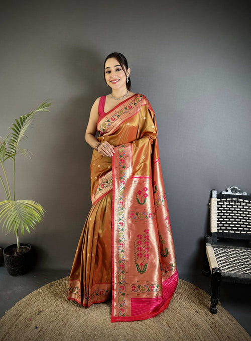 Dista Elora Peach Lichi Silk Ikkat Floral Motifs Zari Woven Paithani Saree