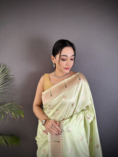 Dista Elora Pista Green Soft Silk Peacock & Floral Zari Motifs Kanchipuram Saree
