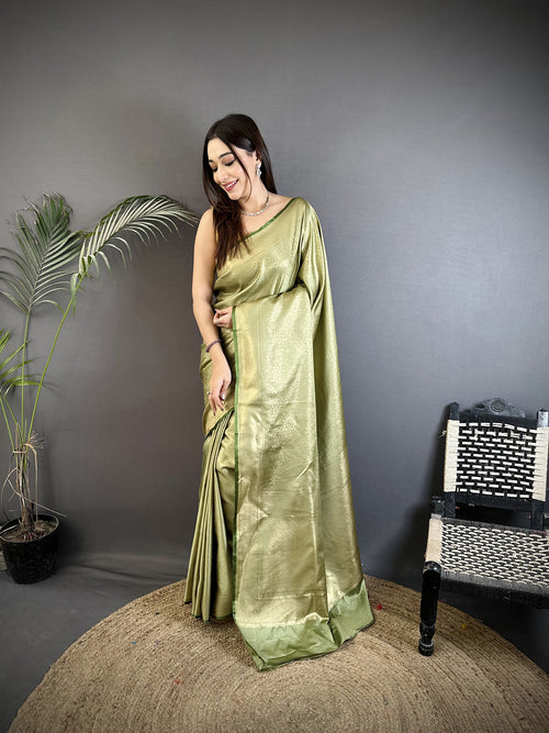 Dista Elora Sage Green Satin Silk Floral Motifs & Ethnic Silver Zari Design Kanchipuram Saree