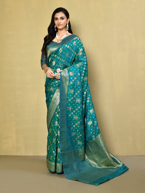 Dista Elora Sea Green Silk Blend Banarasi Woven Designer Saree For Women With unstitched blouse